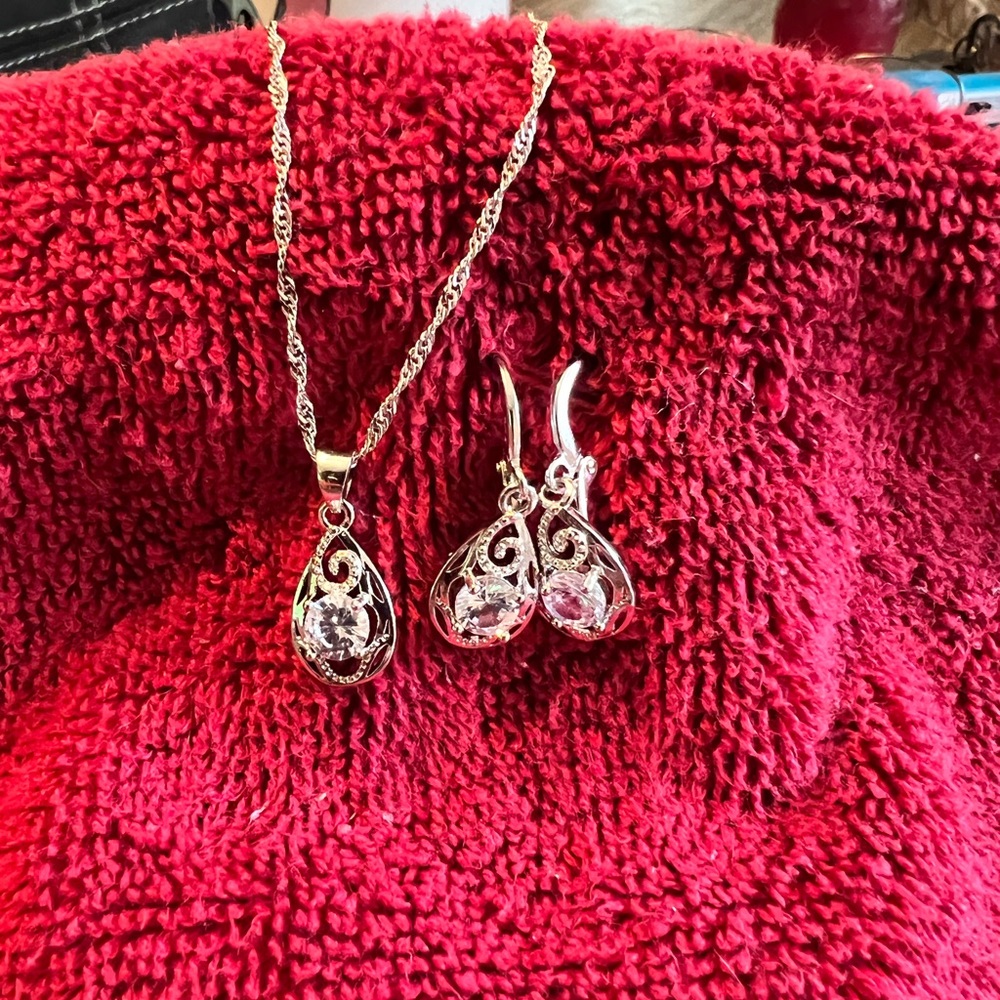 .925 sterling silver and white sapphire necklace and earring